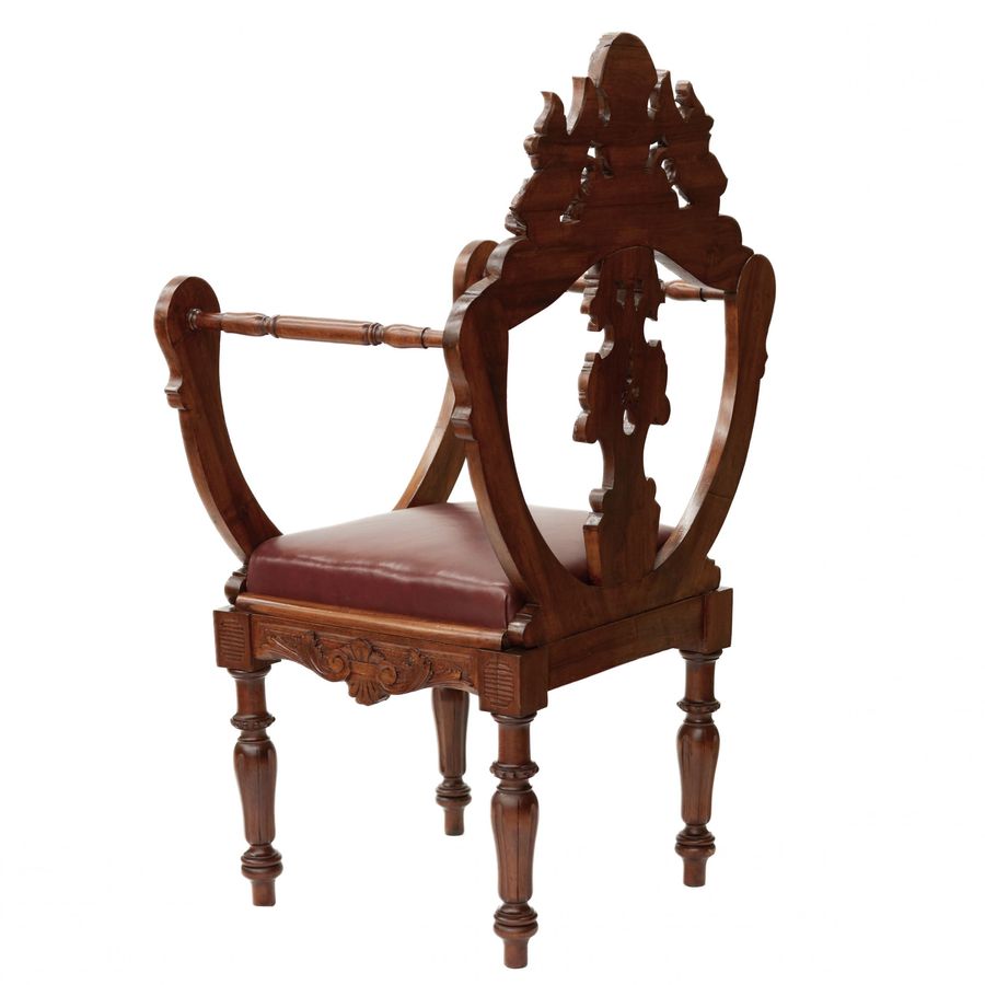 Antique Carved, richly decorated walnut chair. 19th century