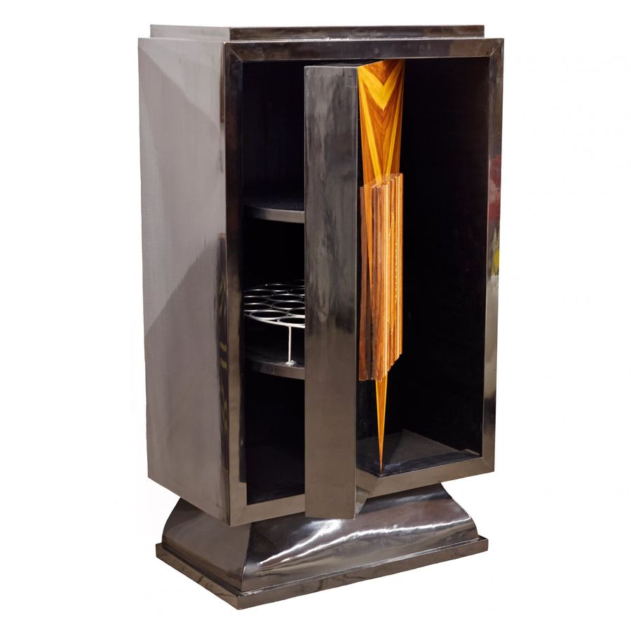 Antique Large, vertical bar in Art Deco style, with a rotating display case. 20th century.