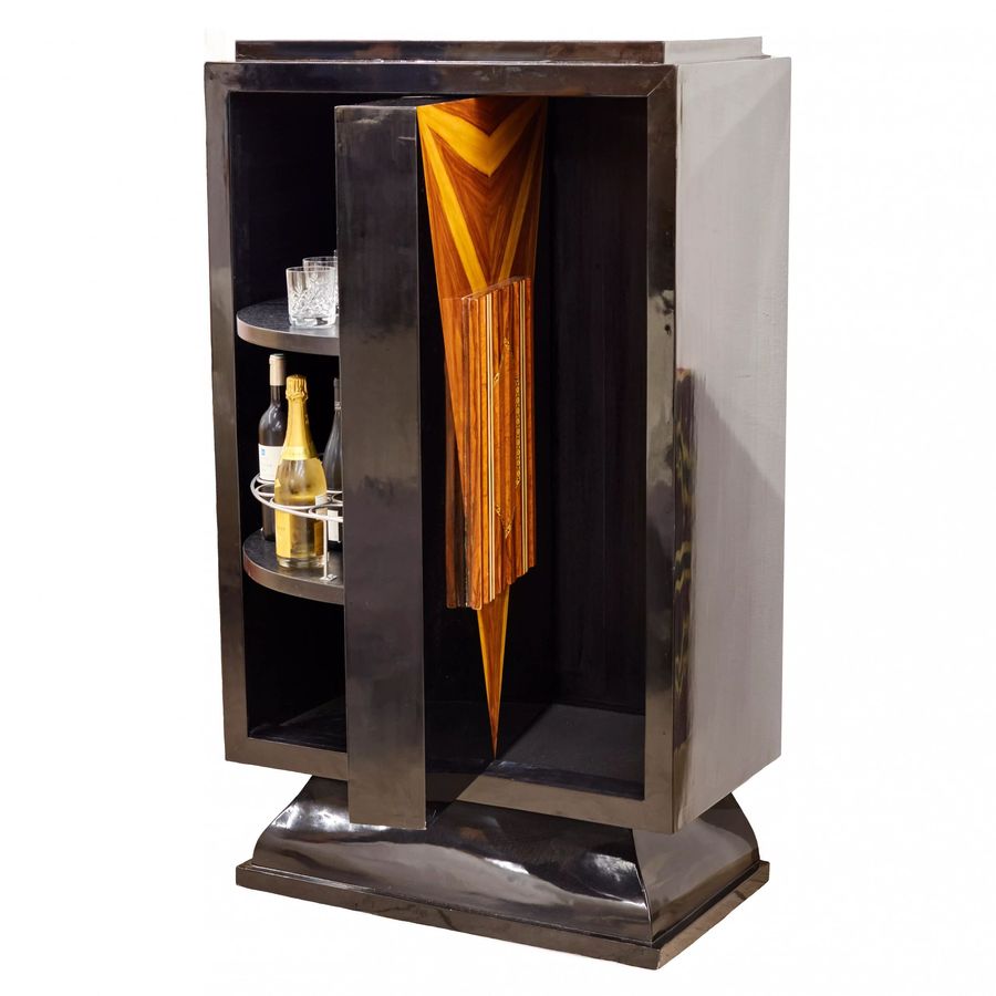 Antique Large, vertical bar in Art Deco style, with a rotating display case. 20th century.