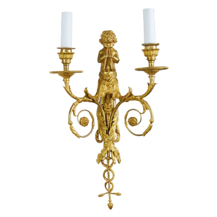 Antique Pair of French gilt bronze sconces, Louis XVI style, 19th century.