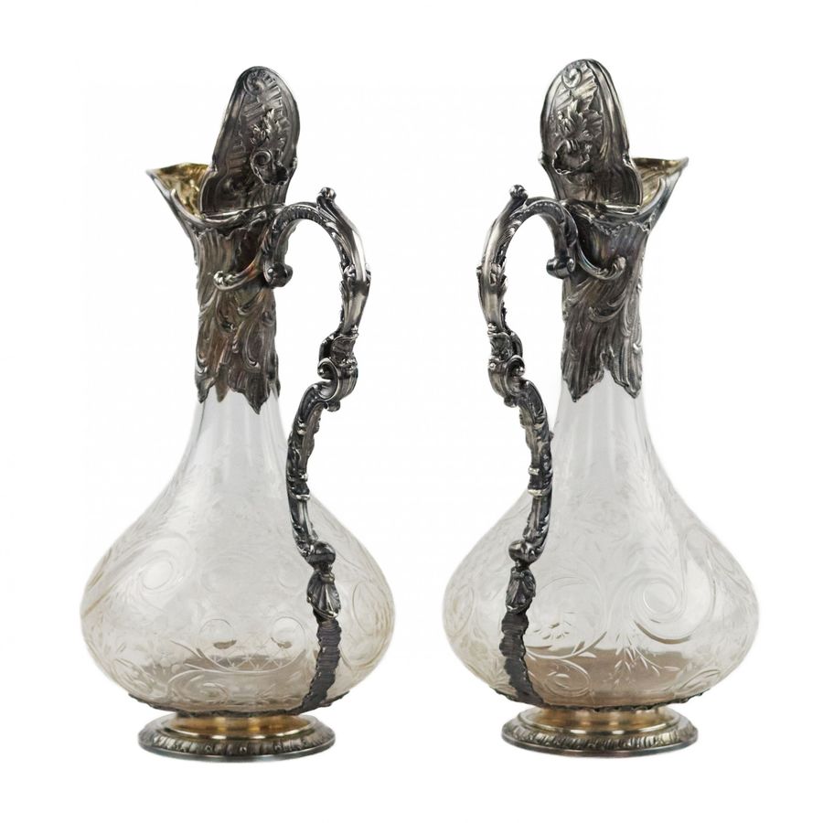 Antique Pair of wine glass jugs in silver, Louis XV style, turn of the 19th-20th centuries.