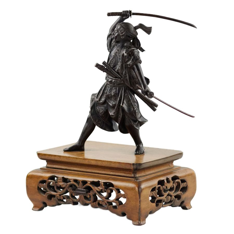 Antique Japanese bronze sculpture of a samurai warrior. Japan. Meiji. The turn of the 19th-20th century.