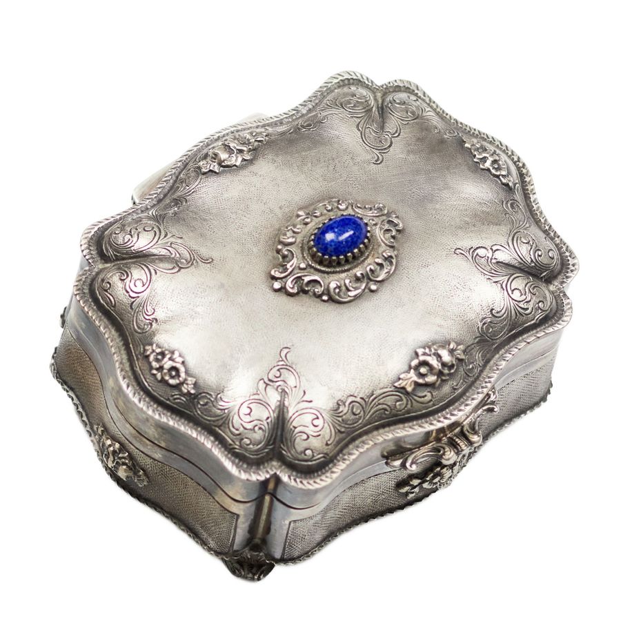 Antique Italian, silver jewelry box of baroque shape.