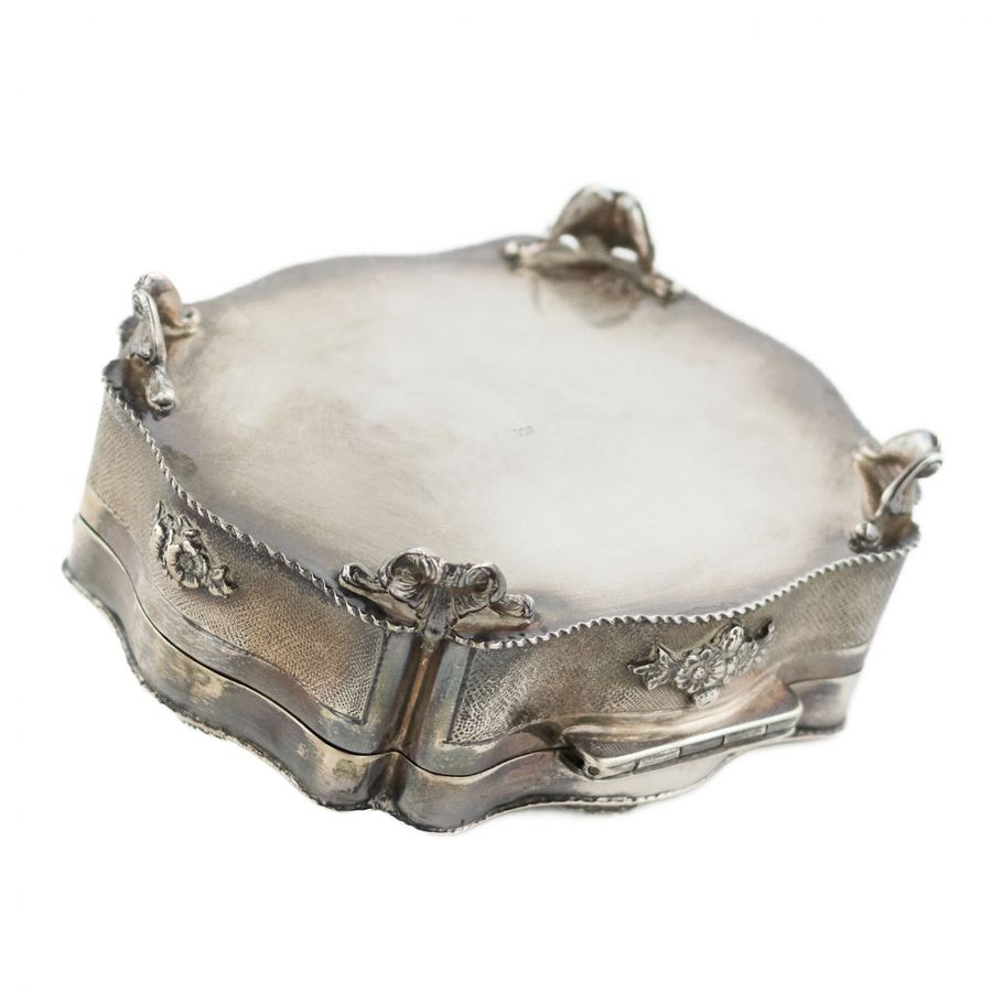 Antique Italian, silver jewelry box of baroque shape.