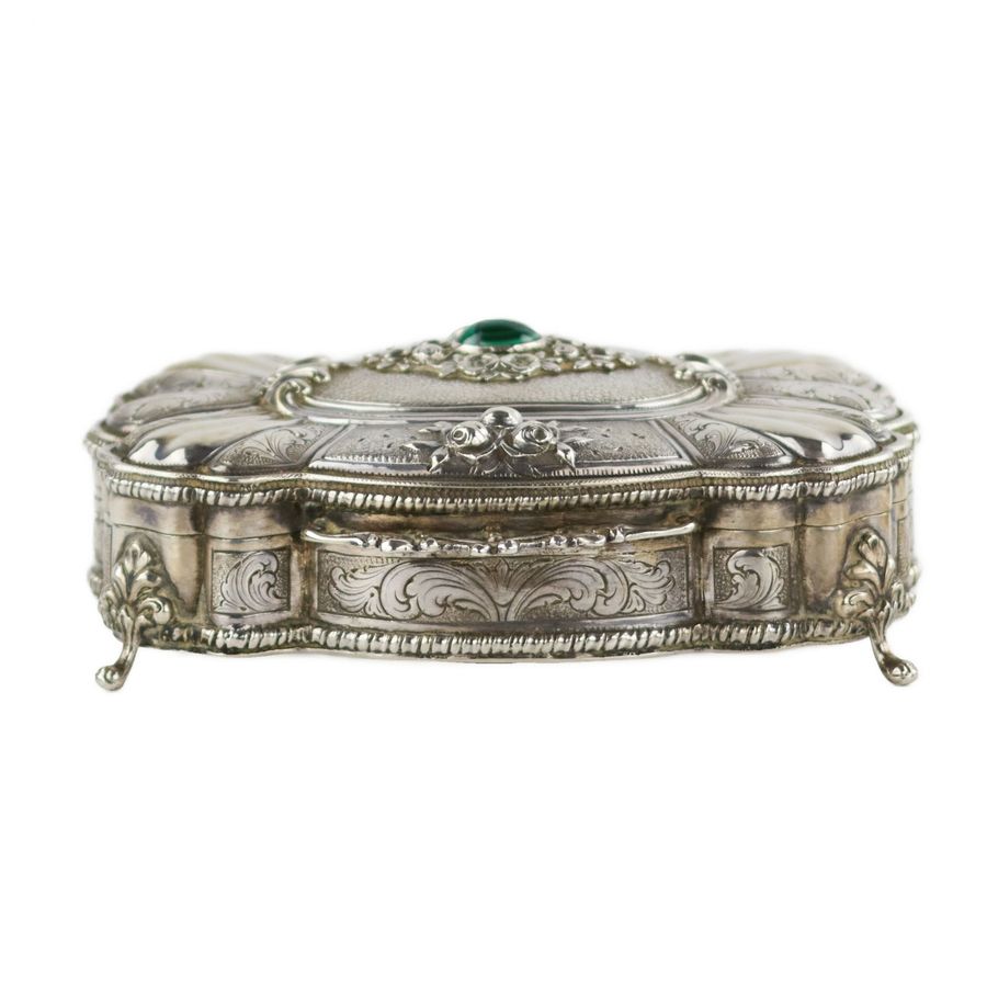 Antique Italian, silver jewelry box of baroque shape. 20th century.