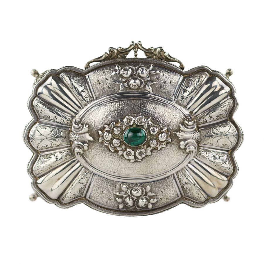 Antique Italian, silver jewelry box of baroque shape. 20th century.