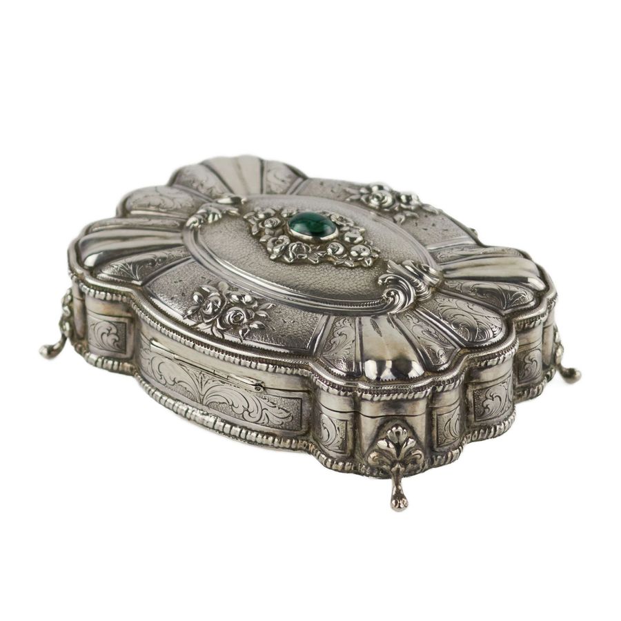 Antique Italian, silver jewelry box of baroque shape. 20th century.