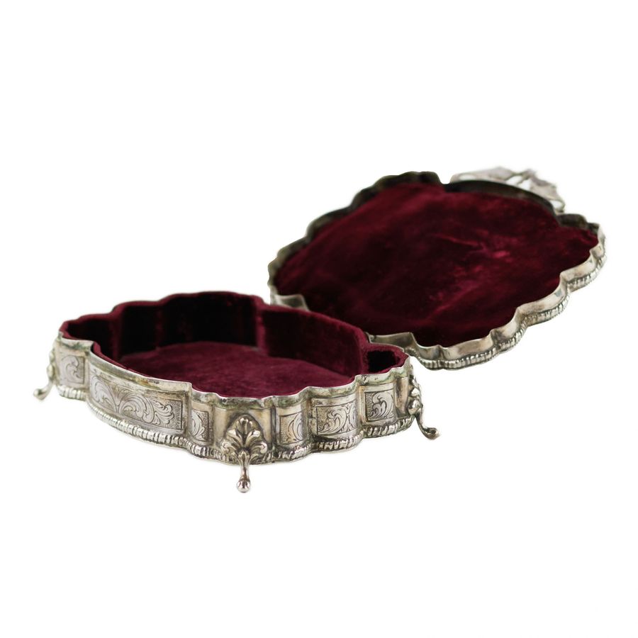 Antique Italian, silver jewelry box of baroque shape. 20th century.