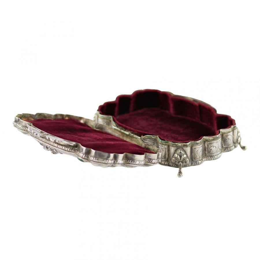 Antique Italian, silver jewelry box of baroque shape. 20th century.