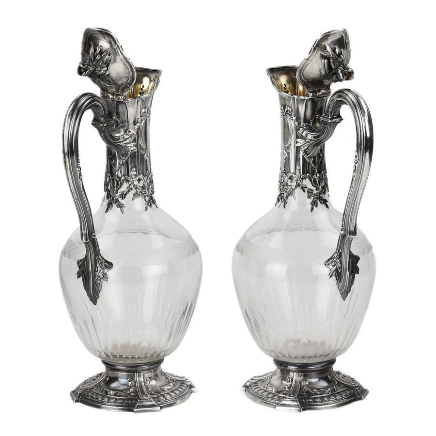 Antique Pair of French glass wine jugs in silver. 19th century.