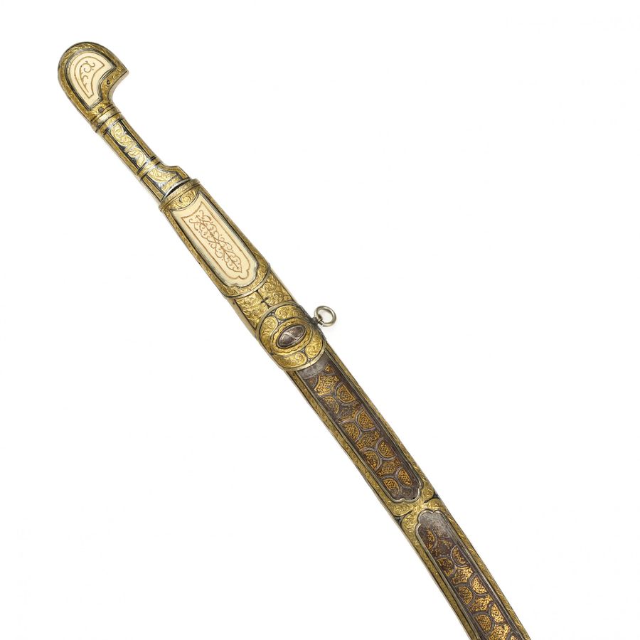 Antique Caucasian saber with gilded silver and ivory decor. Russia. 19th century.