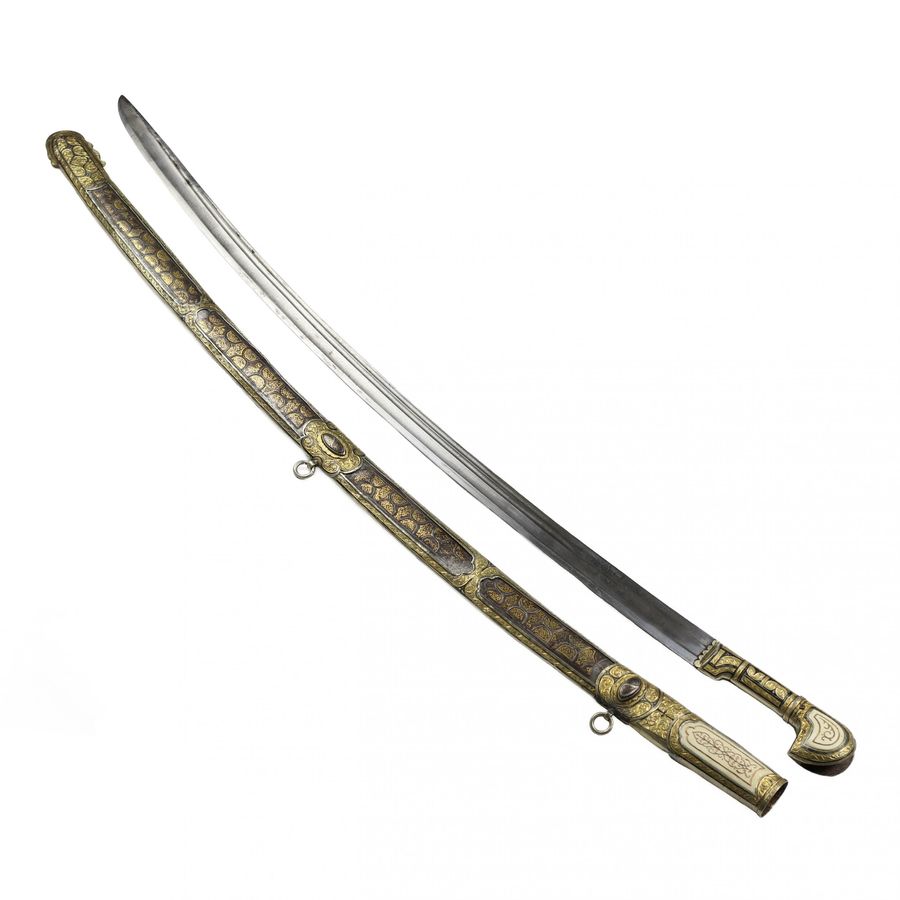 Antique Caucasian saber with gilded silver and ivory decor. Russia. 19th century.