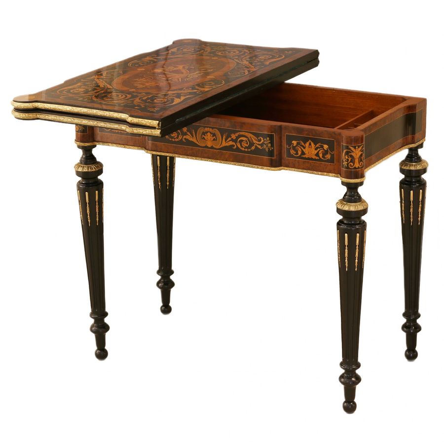 Gaming table decorated with a pattern using marquetry technique. France. Late 19th century