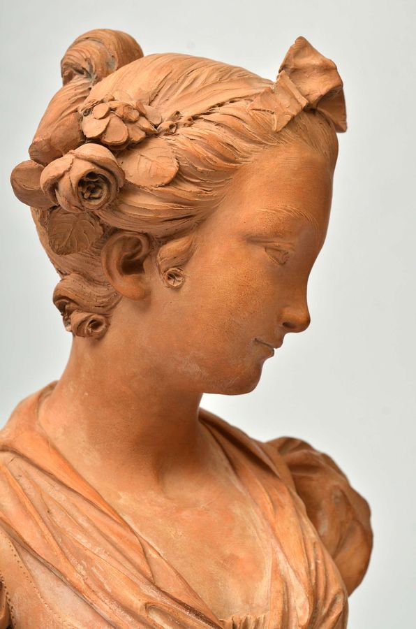 Antique Terracotta bust on a marble base Bust of a Virgin