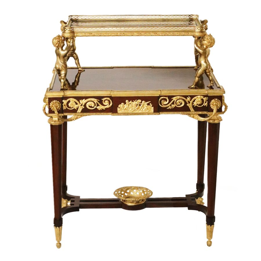 Antique Two-tier tea table with attributes in the Louis XVI style, modeled by Francois Lincke. France, late 19th century