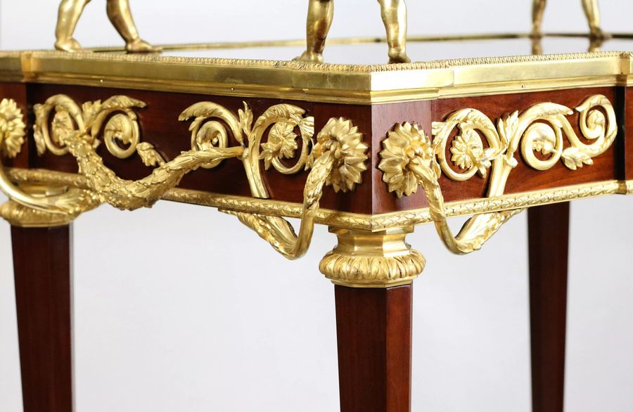 Antique Two-tier tea table with attributes in the Louis XVI style, modeled by Francois Lincke. France, late 19th century