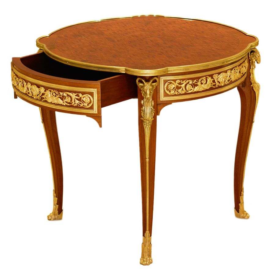 Antique Mahogany table decorated with marquetry in the style of Louis XV, Francois Linke. Late 19th century