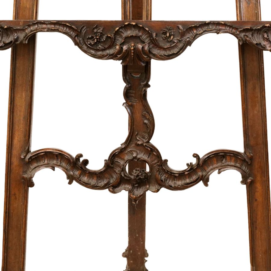 Antique Carved, wooden easel of the turn of the 19th-20th centuries in neo-rococo style.