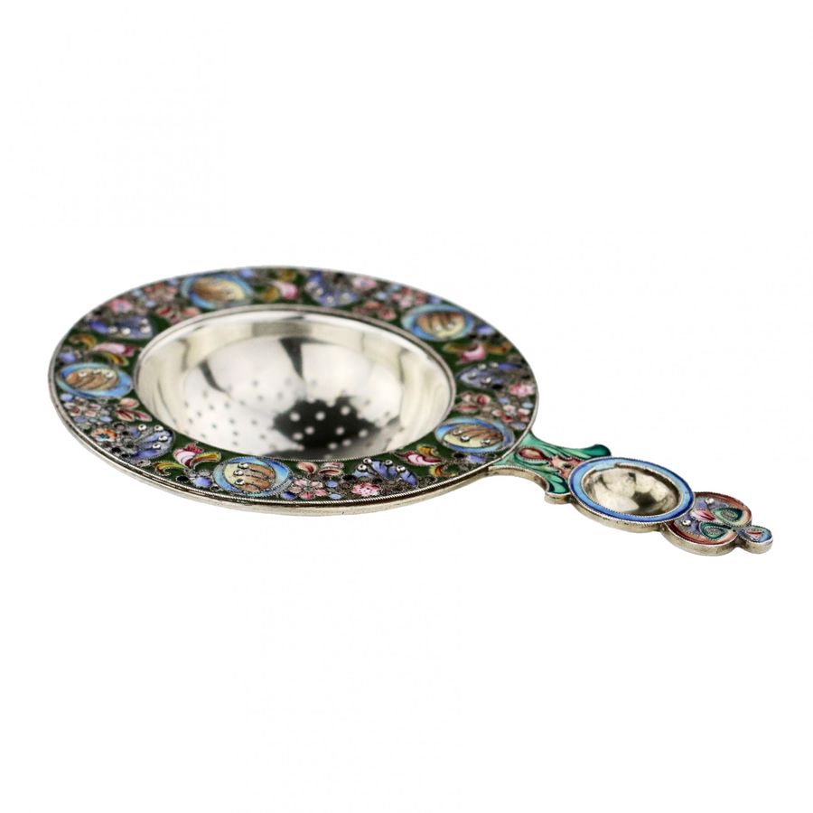 Antique Russian silver tea strainer, with enamel decor, in the spirit of Russian Art Nouveau.