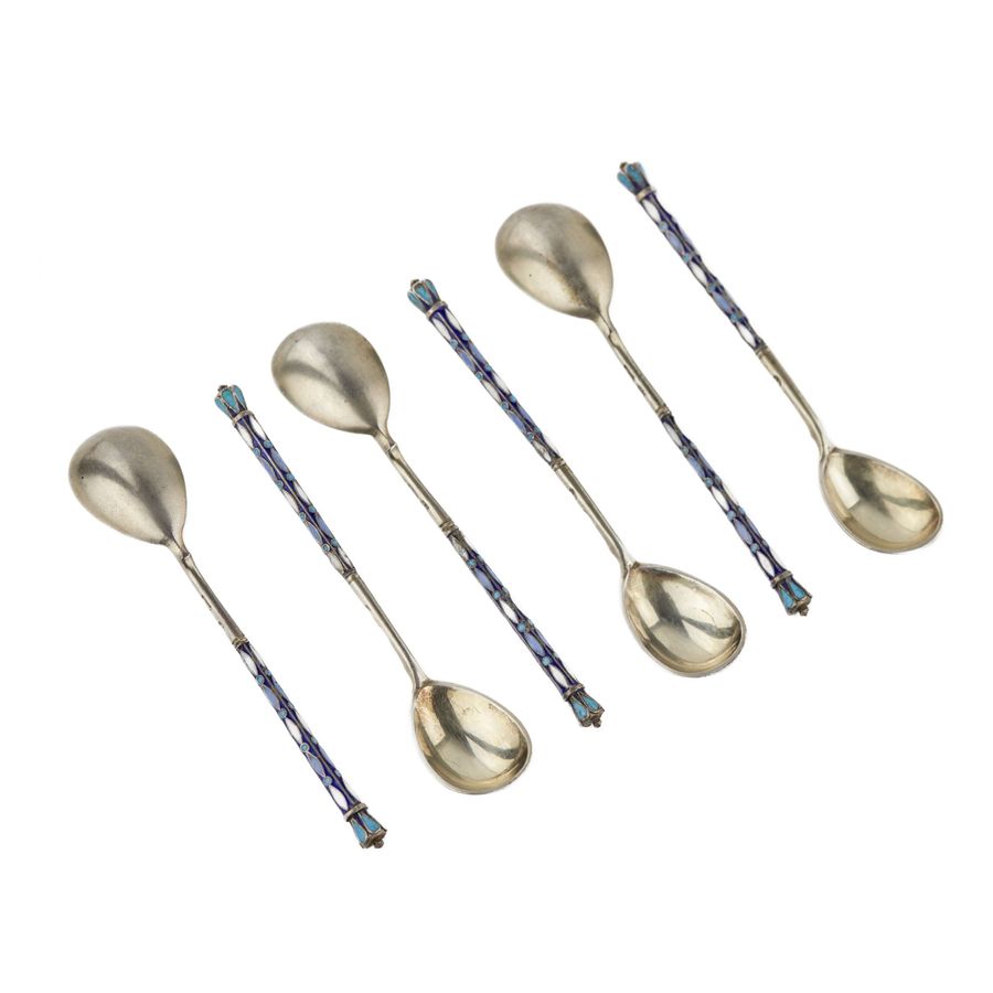 Antique A set of teaspoons decorated with enamel in the original case. Moscow 1908-1917.