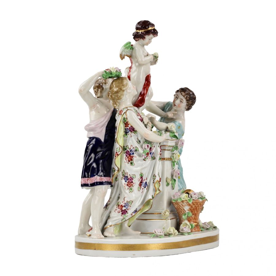 Antique Porcelain group Young people with Cupid.