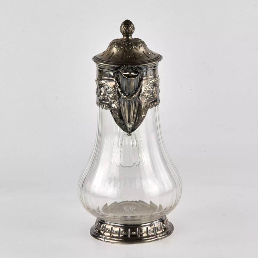 Antique Wine jug, glass in silver.