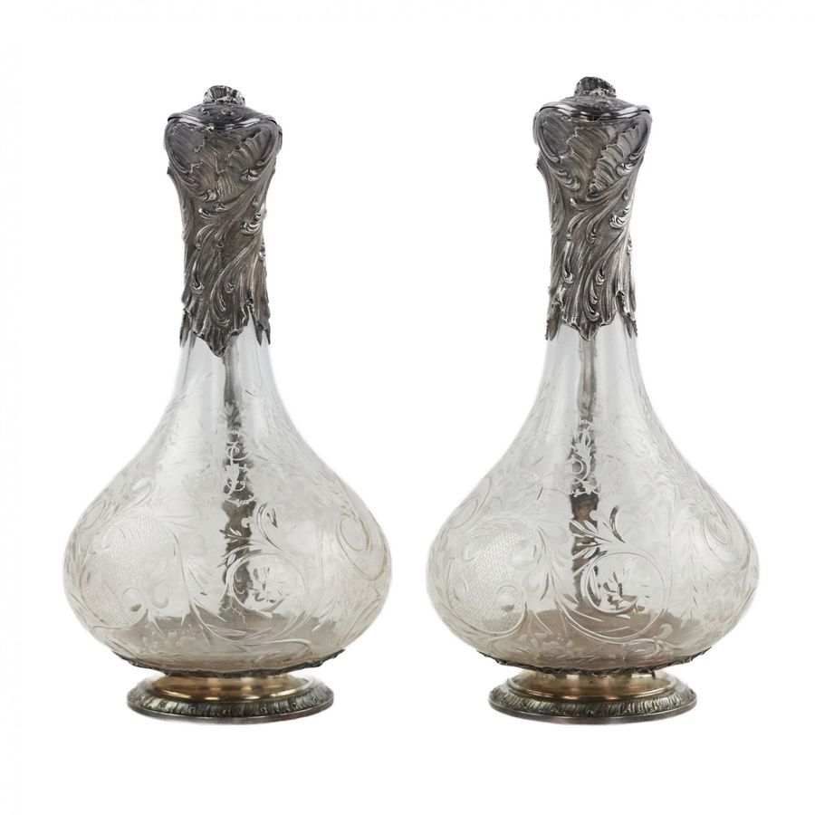 Antique Pair of wine glass jugs in silver, Louis XV style, turn of the 19th-20th centuries.