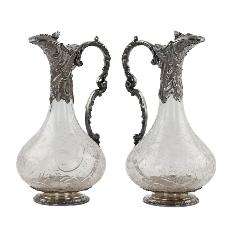 Antique Pair of wine glass jugs in silver, Louis XV style, turn of the 19th-20th centuries.