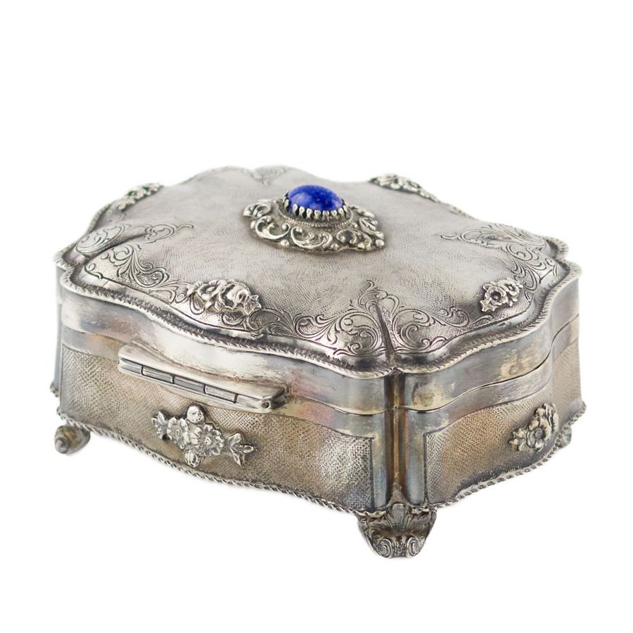 Antique Italian, silver jewelry box of baroque shape.