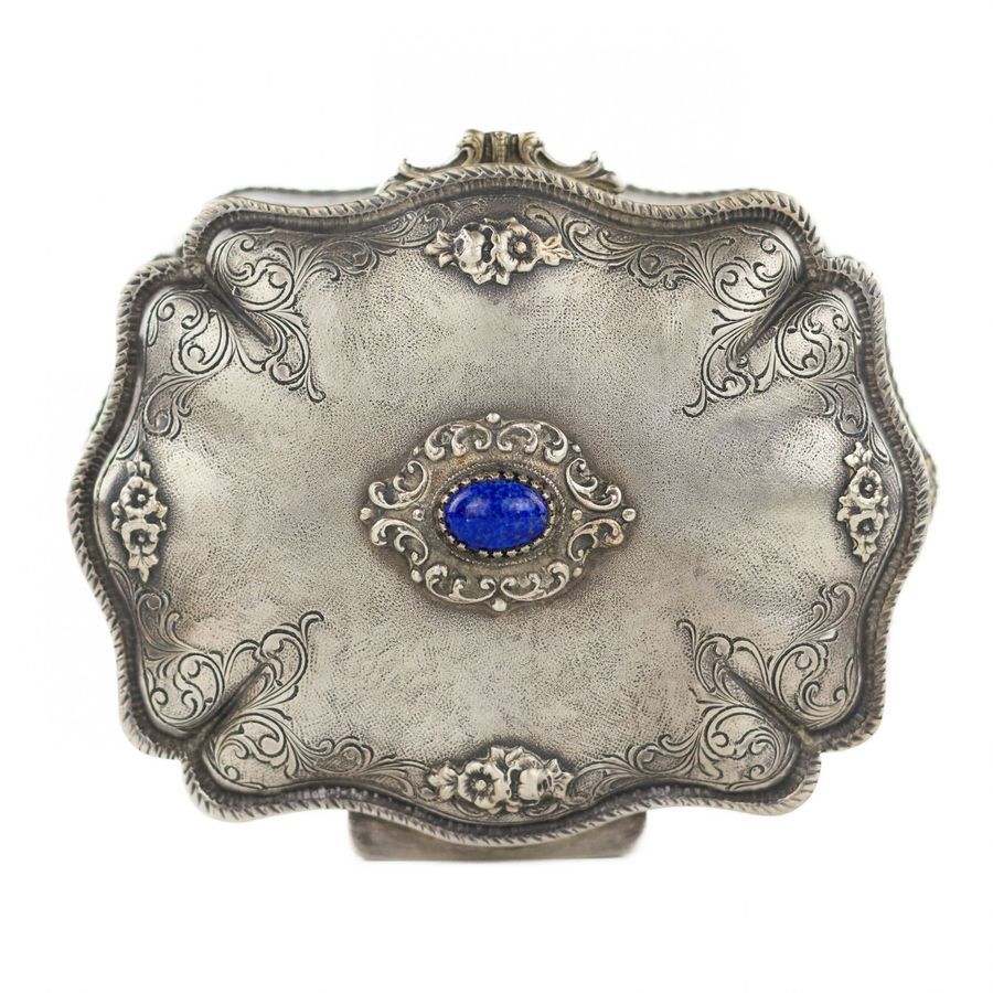 Antique Italian, silver jewelry box of baroque shape.