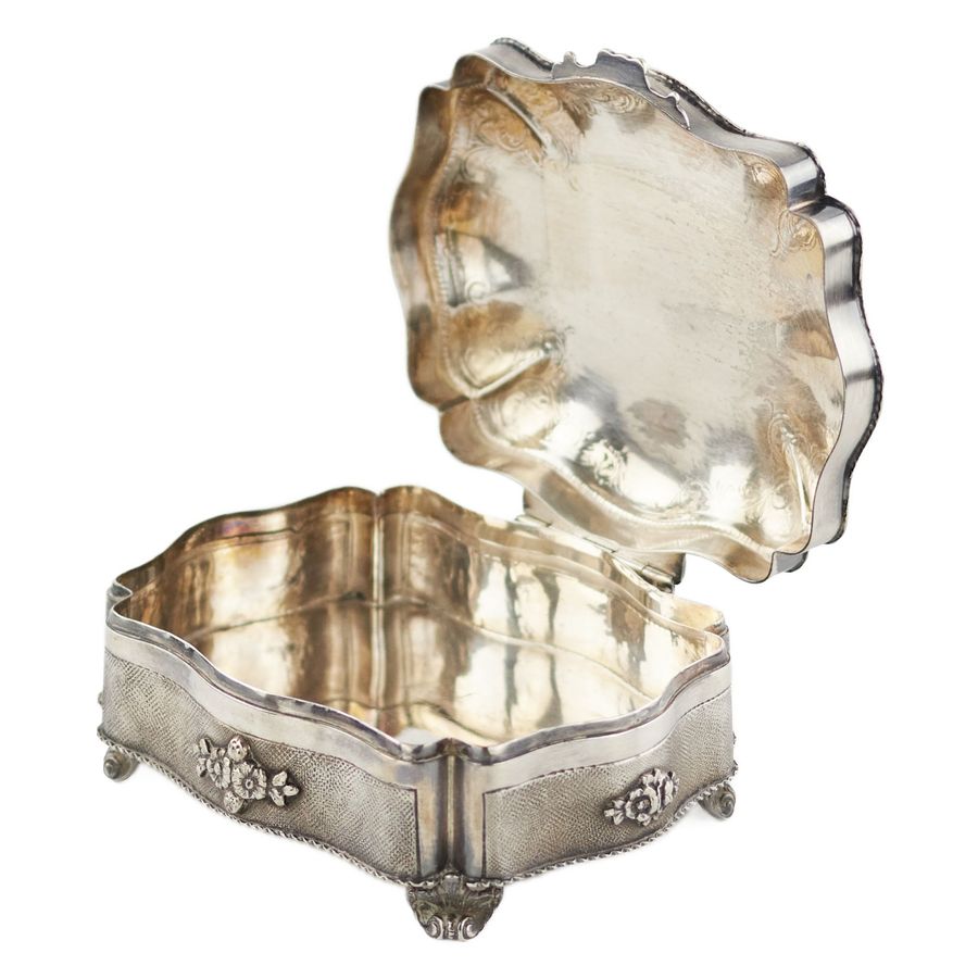 Antique Italian, silver jewelry box of baroque shape.