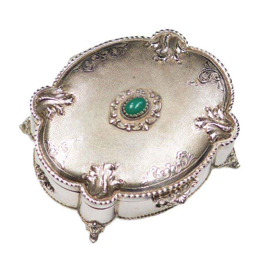 Antique Italian, silver jewelry box of baroque shape. 20th century.