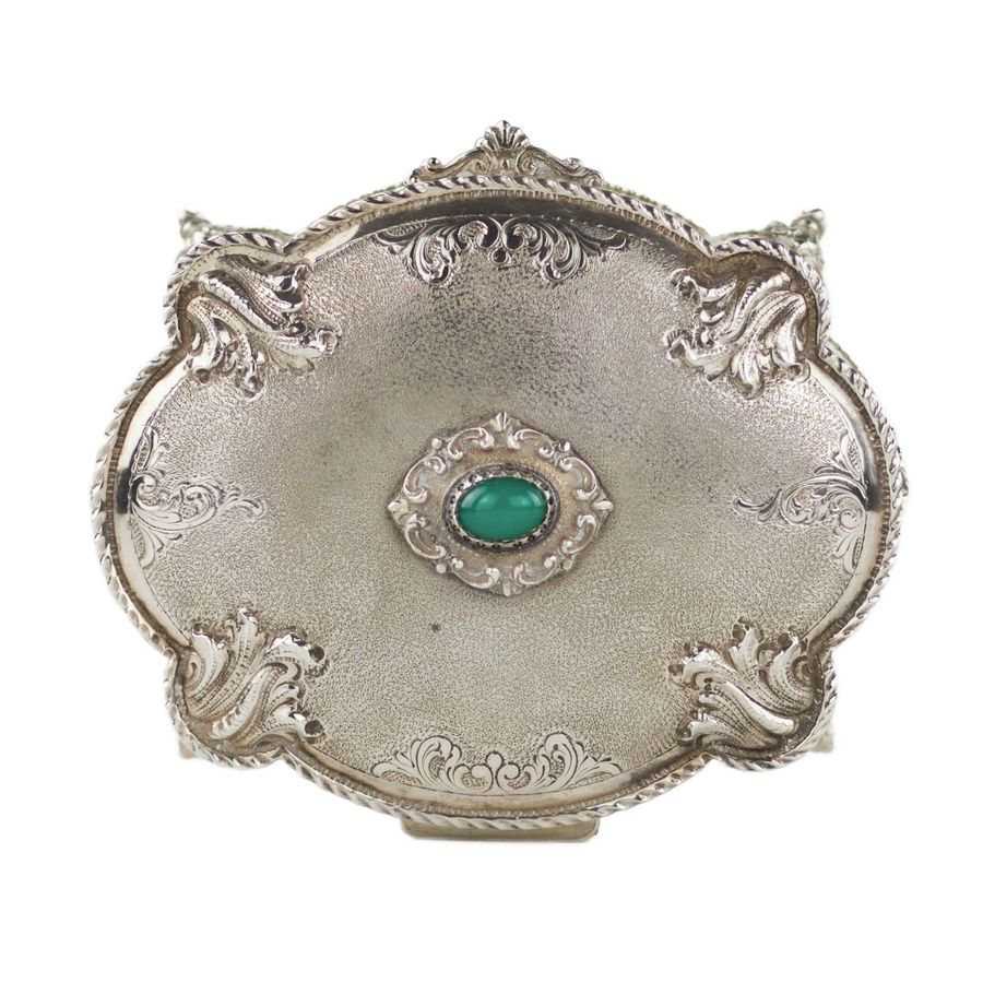 Antique Italian, silver jewelry box of baroque shape. 20th century.