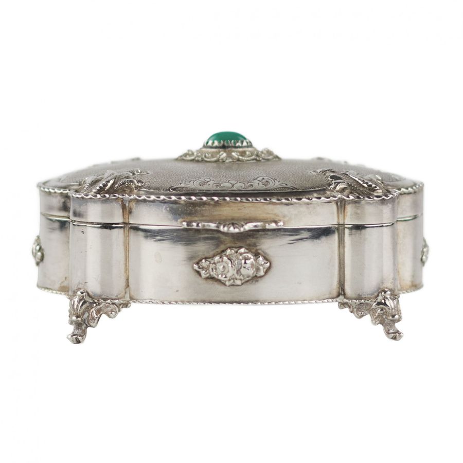 Antique Italian, silver jewelry box of baroque shape. 20th century.