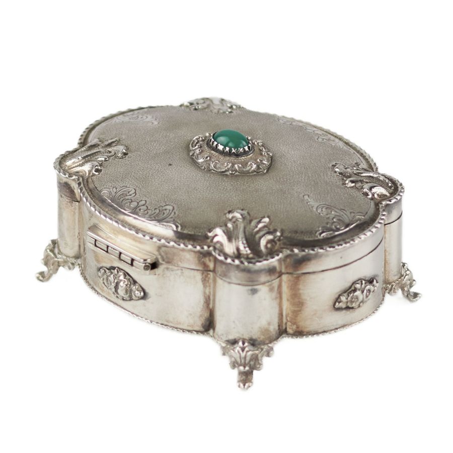 Antique Italian, silver jewelry box of baroque shape. 20th century.