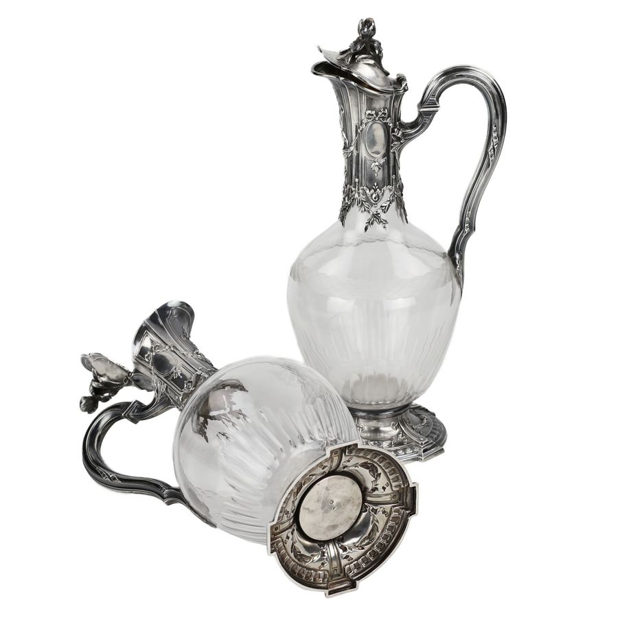 Antique Pair of French glass wine jugs in silver. 19th century.