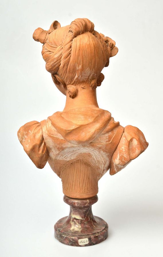 Antique Terracotta bust on a marble base Bust of a Virgin