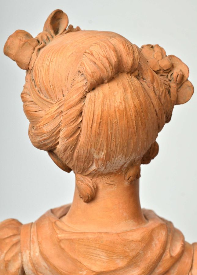 Antique Terracotta bust on a marble base Bust of a Virgin