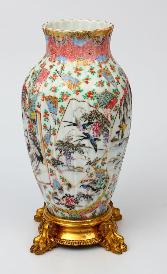 Antique Porcelain vase on a bronze base