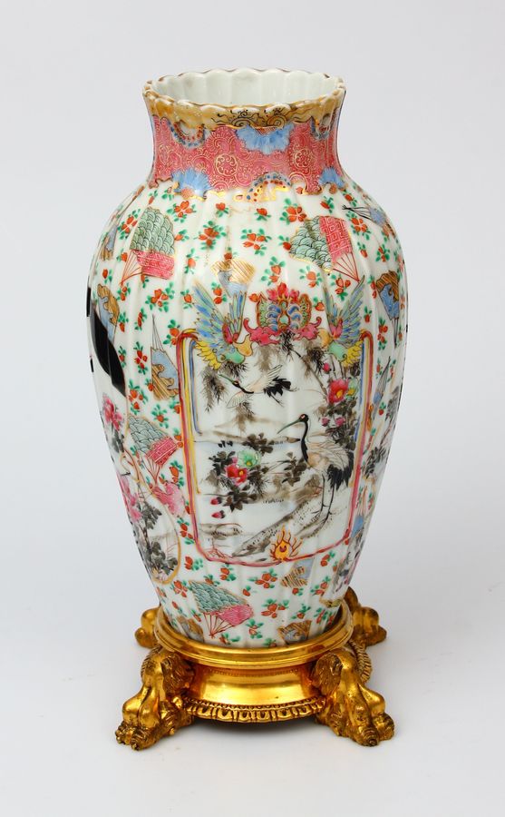 Antique Porcelain vase on a bronze base