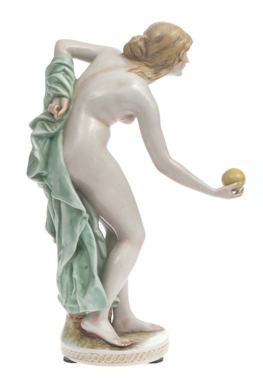 Antique Porcelain figurine A woman who plays with the ball