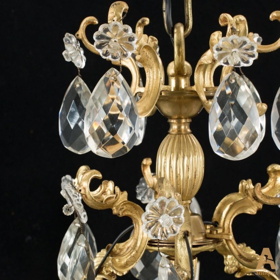 Antique Six-candle chandelier in Rococo style. Europe. First half of 20th century