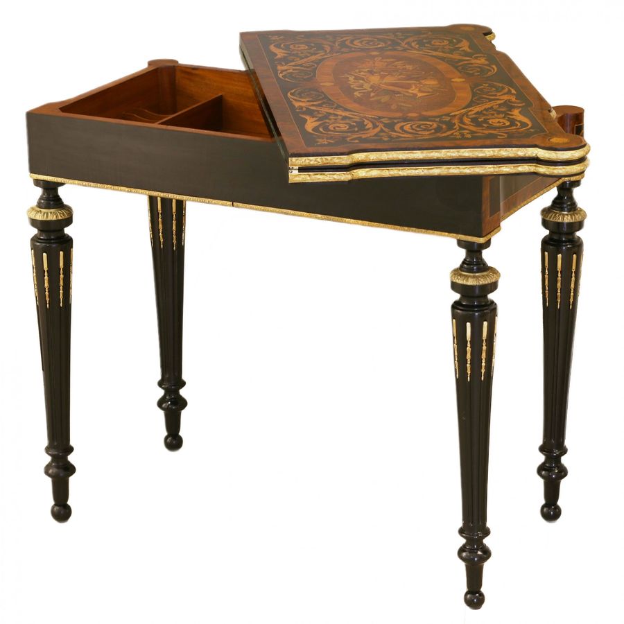 Antique Gaming table decorated with a pattern using marquetry technique. France. Late 19th century