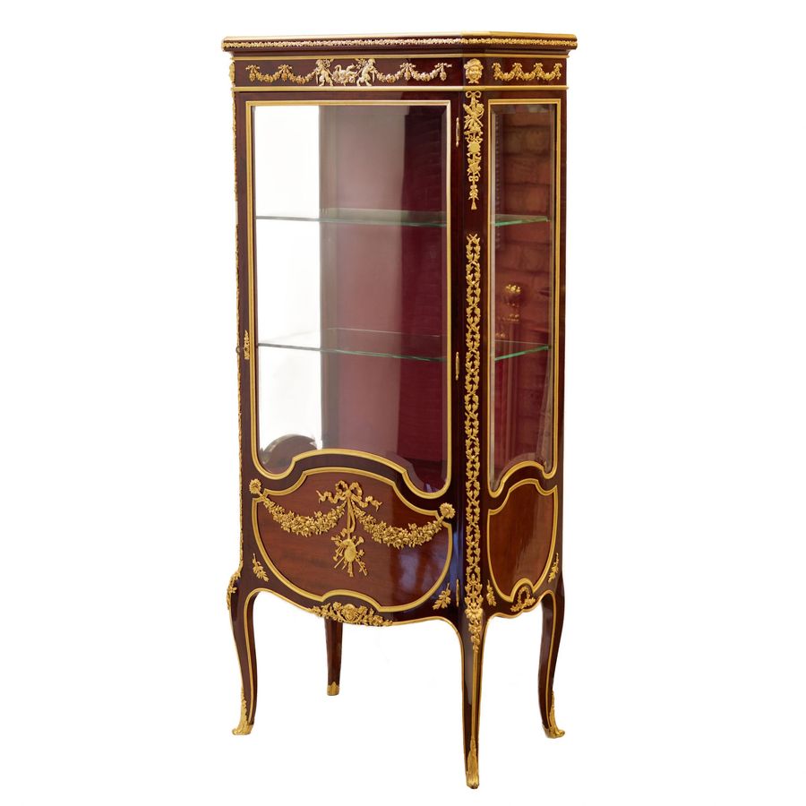 Antique Showcase in mahogany and gilded bronze in Sormani style. France 19th century.