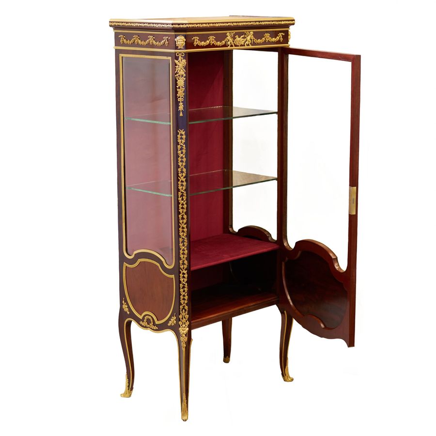 Antique Showcase in mahogany and gilded bronze in Sormani style. France 19th century.