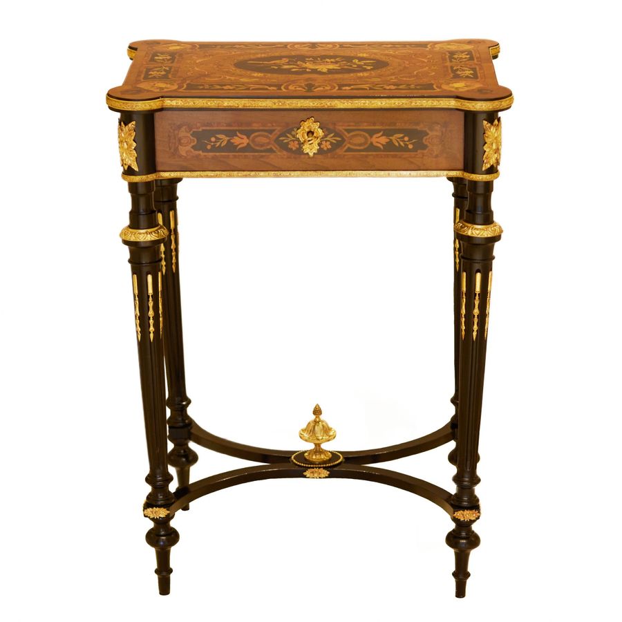 Antique A lovely inlaid wood dressing table with gilded bronze. France late 19th century.