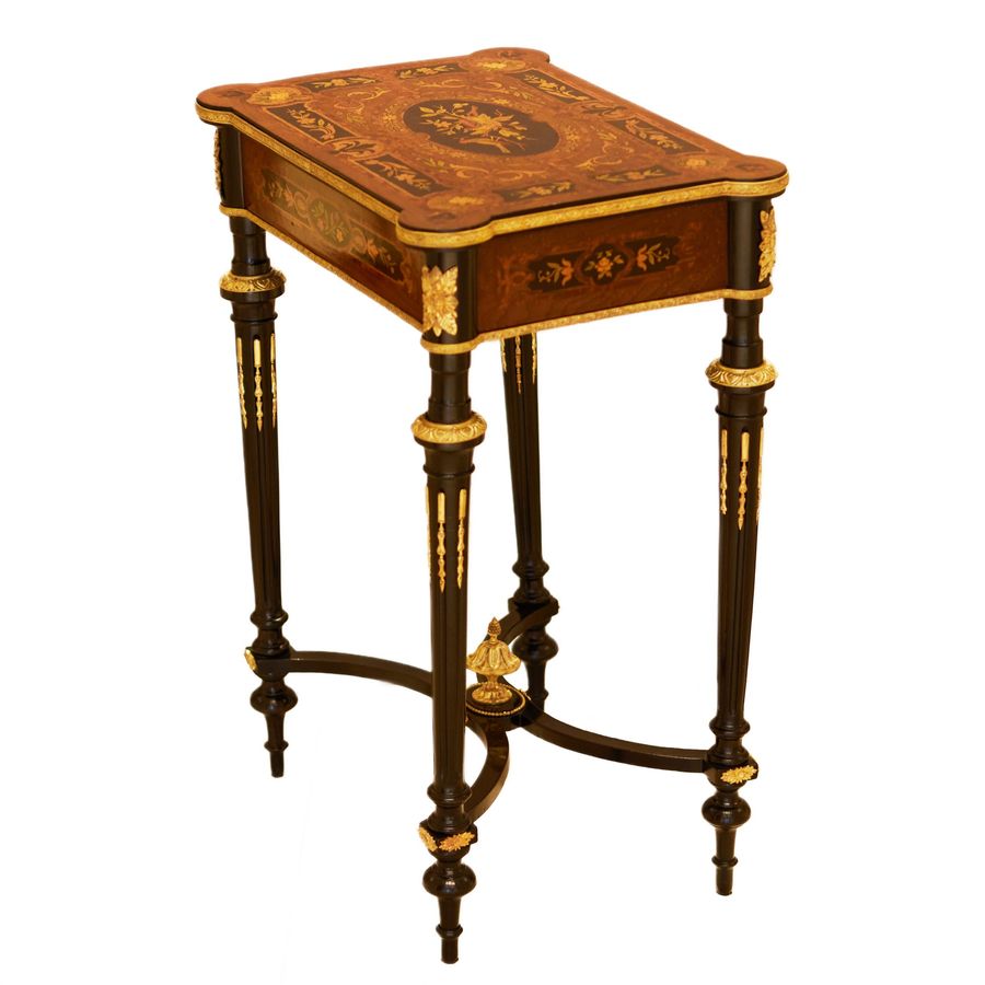 Antique A lovely inlaid wood dressing table with gilded bronze. France late 19th century.