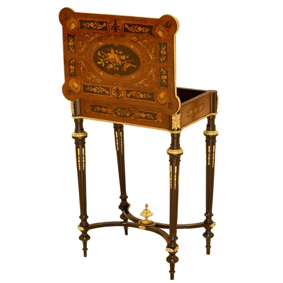 Antique A lovely inlaid wood dressing table with gilded bronze. France late 19th century.