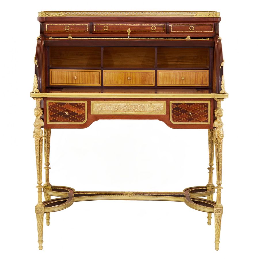 Antique E.KAHN. A magnificent cylindrical bureau in mahogany and satin wood with gilt bronze.