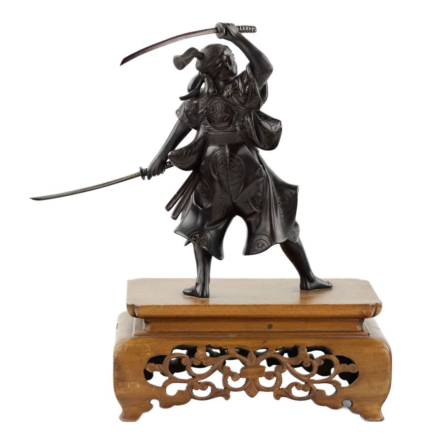 Antique Japanese bronze sculpture of a samurai warrior. Japan. Meiji. The turn of the 19th-20th century.